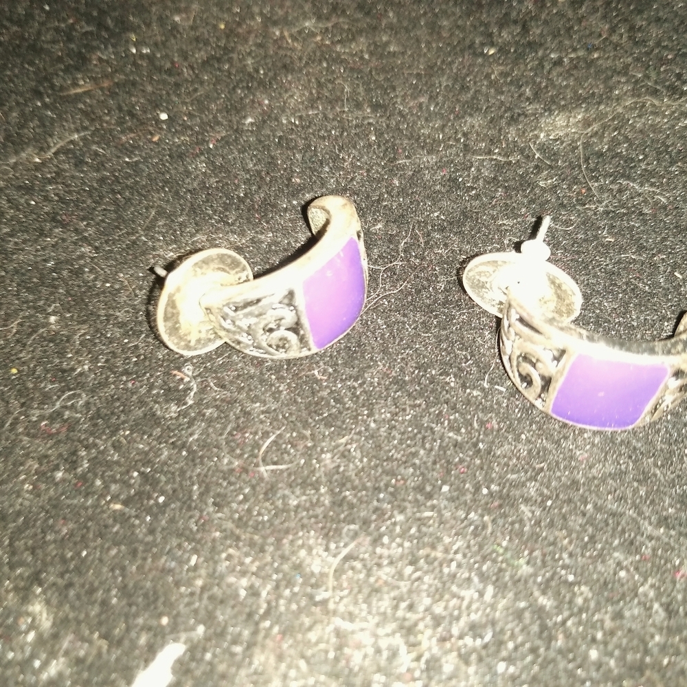 4 pair of silver earrings
